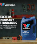 Non Detergent SAE 30 Conventional Motor Oil 1 Quart with beefed up anti wear protection bottle on a workbench.