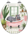 Round Toilet Seat Decorative for Bathroom featuring a hippo in a pink bathtub with plants and a window, whimsical design.
