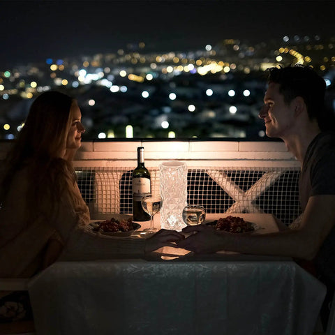 Couple dining on balcony illuminated by Touch Control Rose Crystal Lamp With USB Port 16 RGB Color Changing LEDs Romantic Diamond Table Lamp.