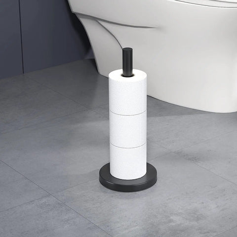 Free Standing Toilet Paper Holder Stand In Matte Black, Built From 304 Stainless Steel, holding 3 rolls in bathroom.