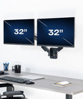 Super Smooth Heavy Duty Double Arm Dual Monitor Wall Mount With Zero Hassle Quick Height Adjustment For Two 17 To 32 Inch Monitors Total Flex Full Motion Articulating Black, featuring two 32-inch monitors on a wall.