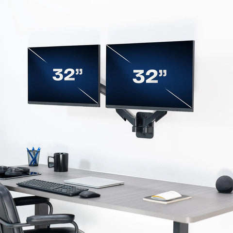 Super Smooth Heavy Duty Double Arm Dual Monitor Wall Mount With Zero Hassle Quick Height Adjustment For Two 17 To 32 Inch Monitors Total Flex Full Motion Articulating Black, featuring two 32-inch monitors on a wall.
