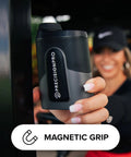 Titan Golf Rangefinder With Slope Switch And Adaptive Slope Technology, held by golfer, focusing on magnetic grip feature.