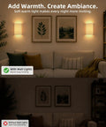 EZVALO Battery Operated Wall Sconce, Pleated Shades Wireless Wall Sconces Set of Two providing warm light in cozy living room.