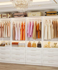 Customizable Four Piece Closet System With Twelve Wooden Drawers And Open Shelves Expands From Eight To Twenty One Feet showcasing clothes and accessories.