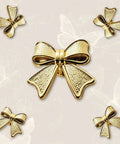 Six Piece Zinc Alloy Bow Drawer Knobs With Vintage Plating And Smooth Curved Handles For Dressers And Vanity Furniture Upgrades That Bring Main Character Energy To Your Space showing elegant gold bow knobs in varying angles.