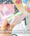 Hand holding six piece bookbinding and scrapbooking tool kit with durable plastic templates for starters.