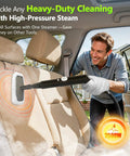 High Performance 2500W Handheld Steam Cleaner With Auto Stop And 15 Piece Accessory Kit cleaning car upholstery with high-pressure steam.