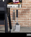 Precision Tongs And Spatula Grilling Tool Set With Hands Free Locking Tongs, 3 Sided Beveled Spatula hanging on grill