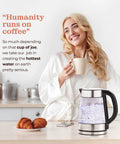 Woman in kitchen with Fast Boil Electric Kettle For Coffee And Tea 1.7L Water Boiler 1500W Borosilicate Glass Easy Clean