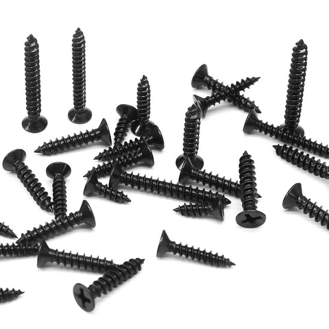 Premium Grade Six Gauge X One Inch Black Wood Screws 120 Piece Pack Carbon Steel Construction Rust Resistant Fasteners scattered on white surface.