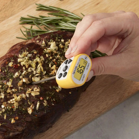 Compact Waterproof Digital Food Thermometer Pro Grade Kitchen Companion With 4.5 Inch Stem, in use on roast meat