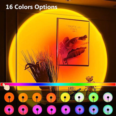 Sunset Lamp With 16 Color Modes And Remote Control Lit Night Light casting orange glow on wall decor in living room
