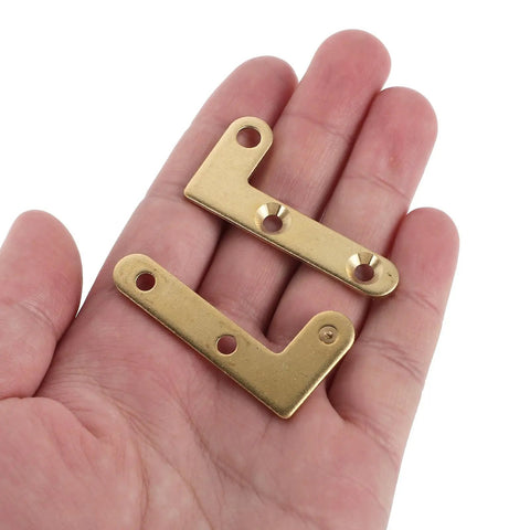 Close-up of Antique Copper Pivot Door Hinges Set for Wooden Doors Dope Hidden Concealed Mechanism in hand