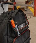 Klein Tools backpack with attached mini ratchet tool featuring Compact Five Piece Mini Ratchet Set For Tight Spots.