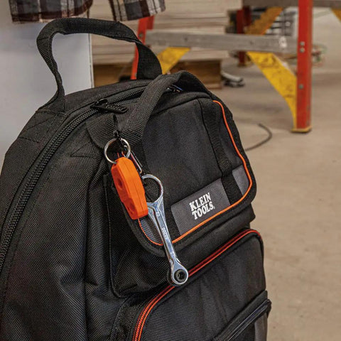 Klein Tools backpack with attached mini ratchet tool featuring Compact Five Piece Mini Ratchet Set For Tight Spots.