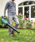 Renewed Brushless Cordless Leaf Blower Handles Your Yard Work Like A Champ With A Solid 459 Cfm And 116 Mph Blast, man using in yard.