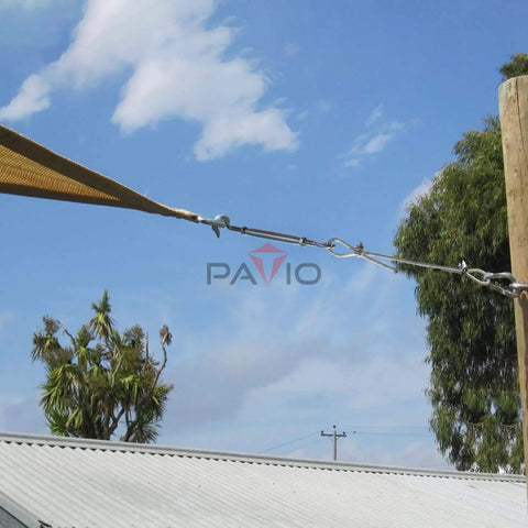 Three Sixteenth Inch Stainless Steel Wire Rope Cable Kit, Thirty Feet Long With Eight Coated Clamps, 7x19 Core Metal For Picture Hanging, Zip Line, Fencing And Shade Sail Hardware connected to a shade sail outdoors.
