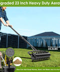 Rolling Lawn Aerator 23 Inch With Heavy Duty 2 Inch Star Shaped Spikes And Adjustable Height Handles Manual Garden Aerator Tool in use on grass