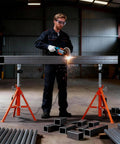Heavy Duty Roller Stand With 2500 Lb Capacity And 28 To 52 Inch Adjustable Height Foldable Tool Stand in metal shop setup