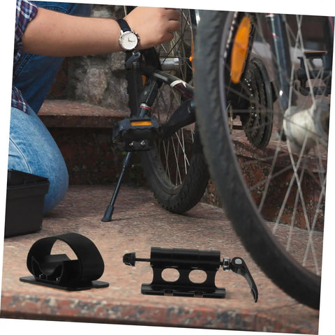 Close-up of Sturdy Aluminum Roof Rack Bike Carrier Mount With Quick Release Fork Bracket being installed on beefy mountain bike