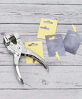 Heavy Duty T Slot Hole Punch Handheld Tool For ID Cards Plastic Cardstock Cardboard And PVC with sample punched cards on wood