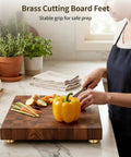 Built Tough Brass Cutting Board Feet Set in kitchen, showcasing 8 solid brass feet, non-slip rubber pads for stable prep surface