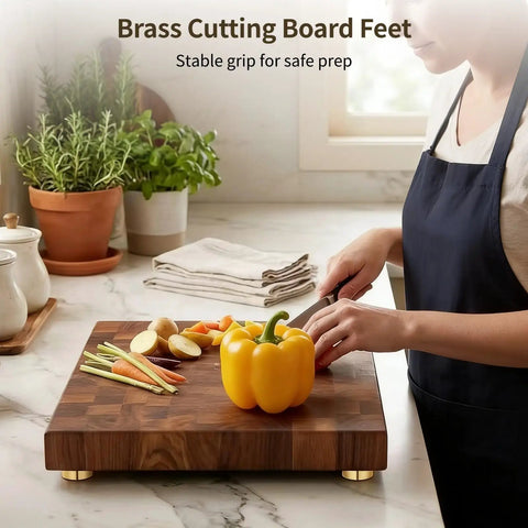 Built Tough Brass Cutting Board Feet Set in kitchen, showcasing 8 solid brass feet, non-slip rubber pads for stable prep surface