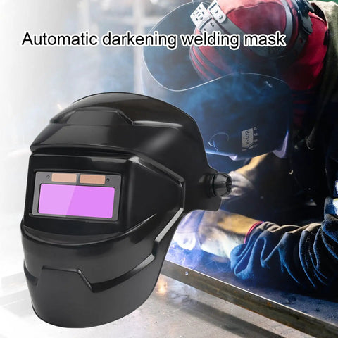 Sun Powered Auto Darkening Welding Helmet With LCD View next to welder in action
