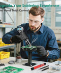 Man using 60W Auto Feed Soldering Iron Gun Kit With Adjustable Temperature LCD Display One Hand Soldering Ready in workshop