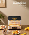 Five Tray Electric Food Dehydrator With Smart Digital Controls And Flexible Temp Settings, displaying dried fruits on a kitchen countertop.