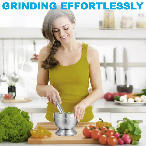 Woman using Stainless Steel Mortar And Pestle Set With Non Slip Base For Spices Herbs And Pesto Making Heavy Duty Kitchen Crusher