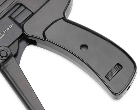 Close-up of a black handle of Zip Tie Gun And Cable Tie Install Tool With Adjustable Tension No Fuss Built In Cutter For Easy Cable Management Works With Nylon Ties Up To Quarter Inch Black.
