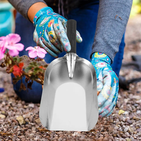 Gardener using Stainless Steel Garden Hand Trowel Go To Transplanting And Soil Loosening Tool Small Square Shovel with ergonomic grip.