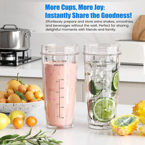 Ninja Blender Replacement Parts Kit With Two 24 Oz Cups And To Go Lids, filled with smoothie and water, on kitchen counter