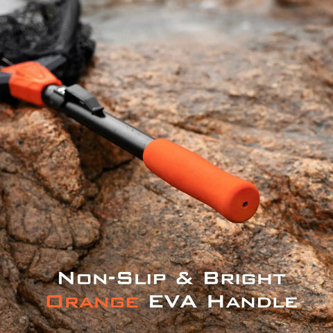 Foldable Lightweight Landing Net With Built In Length Scale And 61In Extendable Aluminum Handle Floating Design on rocky surface, orange EVA handle visible.