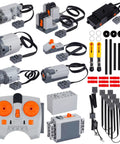 Power Function Motor Set Kit with 40 piece M L XL and servo motors, remote control, battery boxes, receivers, light cables, switches, and wires.