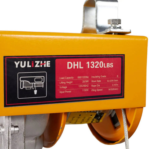Close-up of Electric Hoist 1320 Lbs Winch With Remote Control 110V Lift System label showing specifications in garage equipment.