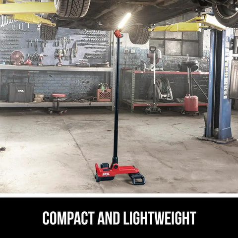 Compact Collapsible Tower Work Light With Foot Pedal Switch Hella Bright 12v And 20v Compatible Battery Power Tool Setup For Job Sites in auto shop.