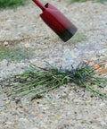 Vapor Torch Kit With Squeeze Valve And Adjustable Pilot 500,000 BTU Propane Weed Burner in use on gravel surface