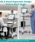 Game Changer Height Adjustable Medical Computer Cart With Sturdy Monitor Mount And Smooth Ride Wheels Top Shelf Sit Stand Mobile Workstation in hospital, height adjustment view.