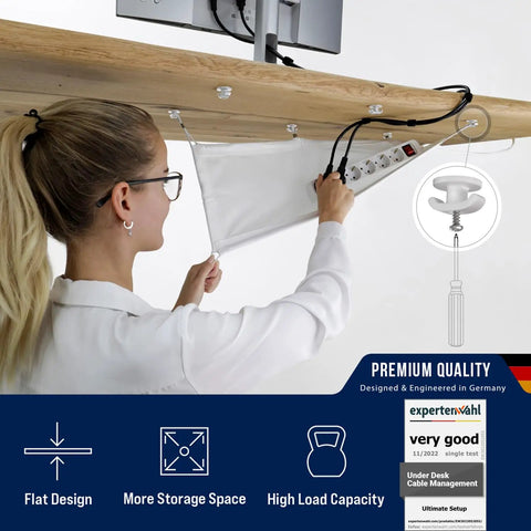 Person installing under desk cable management net flexible wire organizer tray white for neat gaming and home office setups