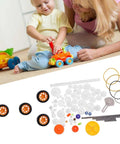 Child playing with toy beside 78 Piece Plastic Gear Set With Pulleys Belts Shafts DIY Kit For Toys And Models.