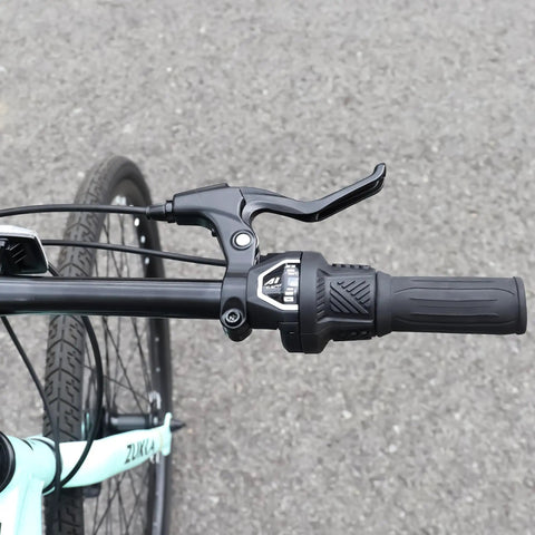 Close-up of Six Speed Right Twist Shifter For Bikes Boss Grip Shifting On Mountain Folding Kids And Hybrid Bikes handlebar view.