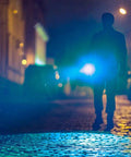 Silhouette of person using Flateye High Performance Flashlight With Cree LED Multi Position Beam Waterproof And Shockproof 1700 Lumens