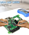 Person using Beefy 4000-Count Auto-Ranging Digital Multimeter Kit for AC/DC voltage testing on circuit board