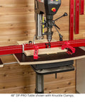 Dead Nuts Straight 36 By 36 Inch Drill Press Table Master System on workstation with knuckle clamps and adjustable fence.