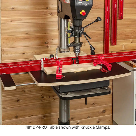 Dead Nuts Straight 36 By 36 Inch Drill Press Table Master System on workstation with knuckle clamps and adjustable fence.