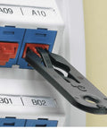 Side view of Panduit PSL-DCJB-BL RJ45 jack blockout device installed beside blue keystone jacks