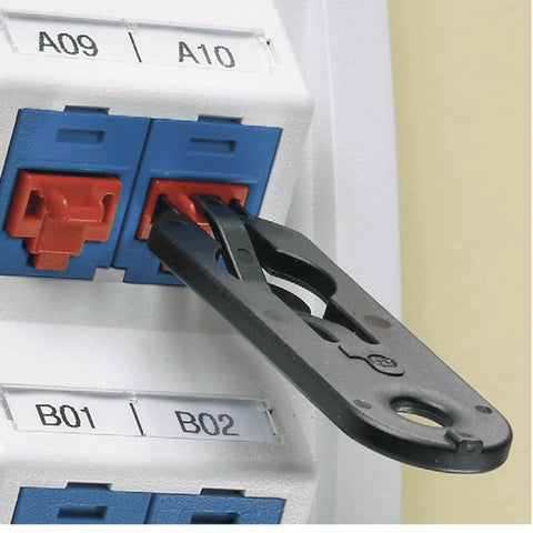 Side view of Panduit PSL-DCJB-BL RJ45 jack blockout device installed beside blue keystone jacks